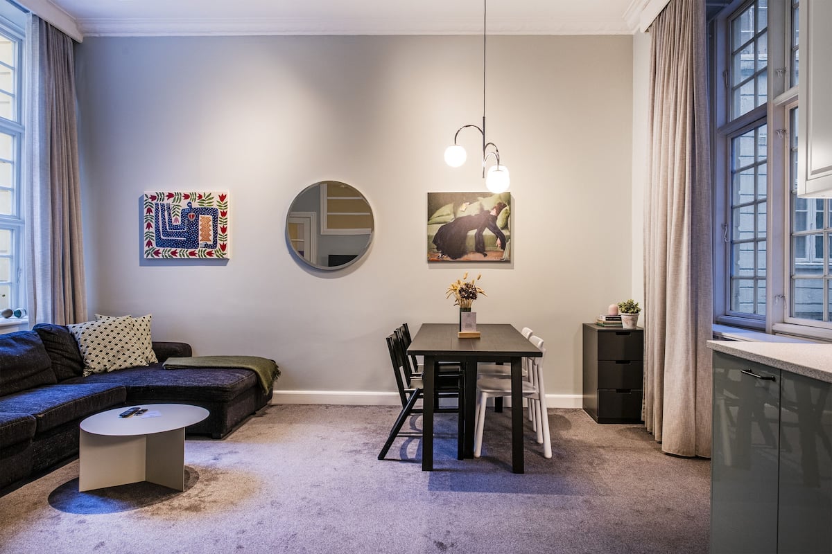 Classic Apartment, Private Bathroom (Courtyard) | Living area | Flat-screen TV, pay movies