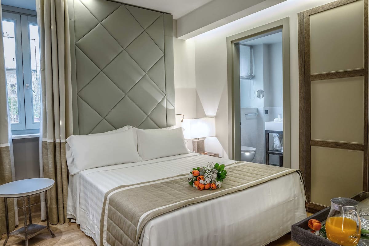 Frette Italian sheets, down duvets, memory-foam beds, minibar