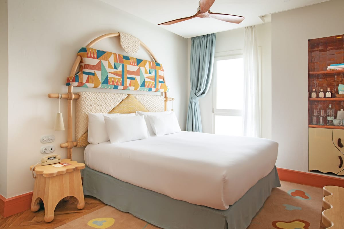 Premium bedding, down duvets, minibar, in-room safe