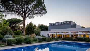 Indoor pool, outdoor pool, open 9:30 AM to 8:00 PM, pool umbrellas