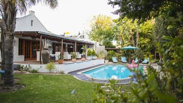 Outdoor pool, pool umbrellas, pool loungers