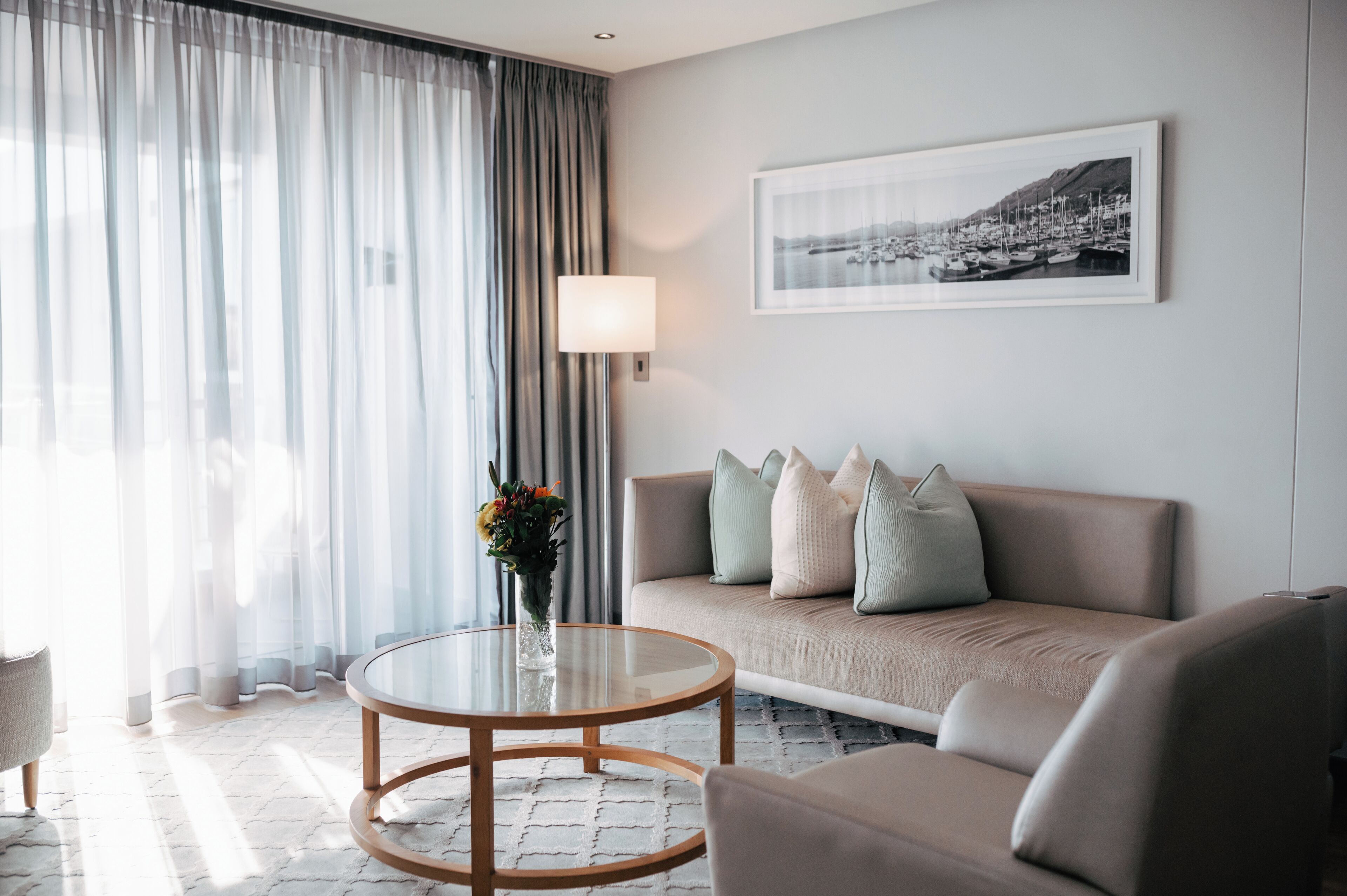 king suite marina view | living area | flat-screen tv