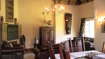 Family Chalet, 4 Bedrooms (Dbl-Storey Luxury Chalet 8 Sleeper) | Living area | Flat-screen TV, fireplace, DVD player