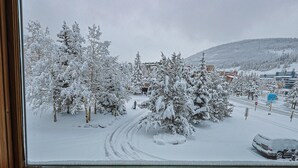 A snowy landscape with trees and a road. - Summit House 2 bed 2 bath B (Copper Mountain)
