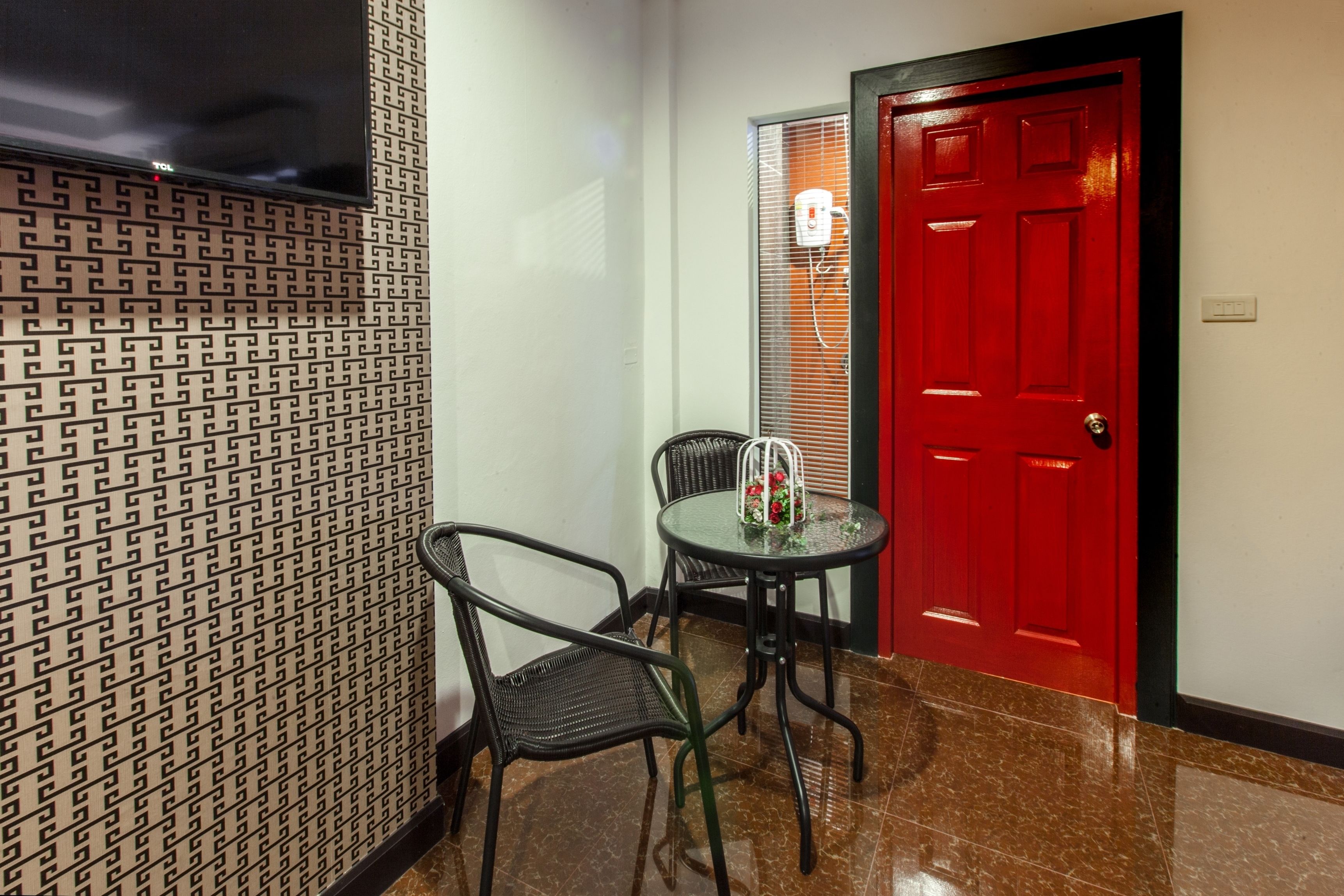 deluxe triple room | living area | 32-inch lcd tv with cable channels, tv