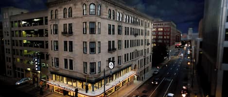 A historic hotel building with a classic architectural style, featuring multiple stories and a prominent corner location.