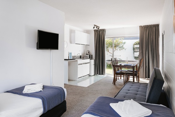 One Bedroom Apartment | Living area | 32-inch Smart TV with cable channels, TV, Netflix