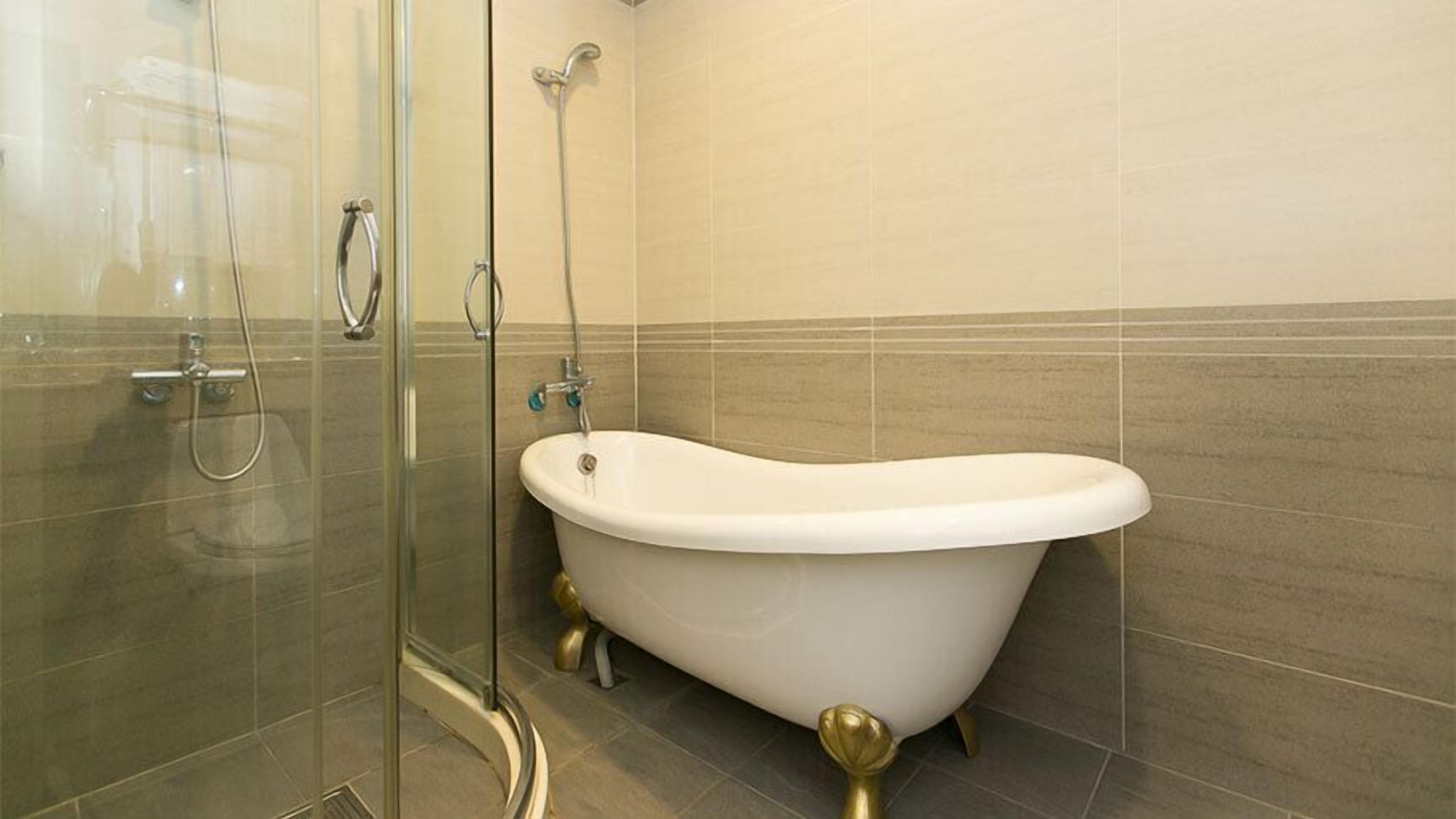 family room | bathroom | shower, free toiletries, hair dryer, slippers
