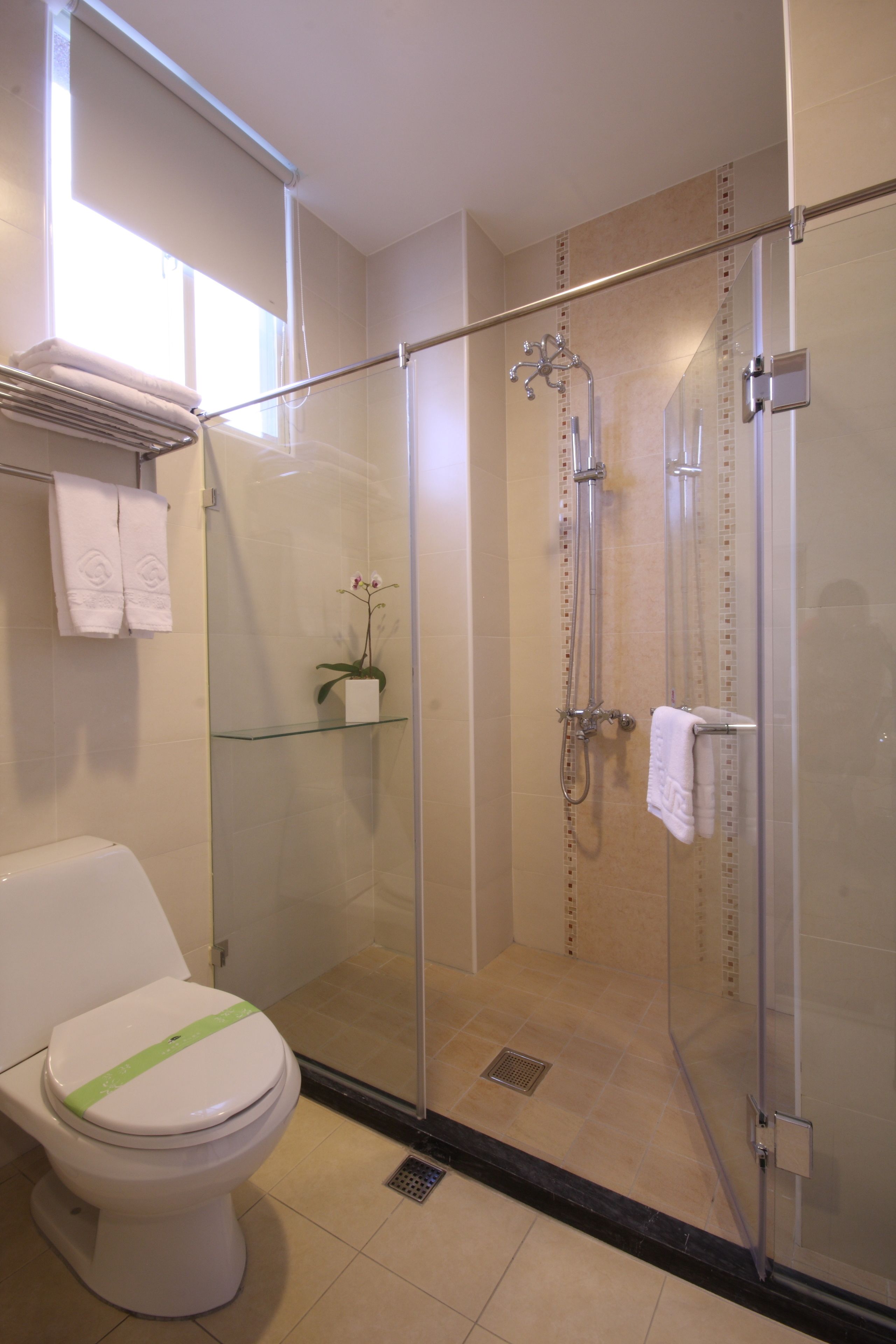 business room | bathroom | shower, free toiletries, hair dryer, slippers