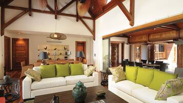 Luxury Villa, 5 Bedrooms, Private Pool, Beachfront | Living room | 50-inch flat-screen TV with satellite channels, TV, DVD player
