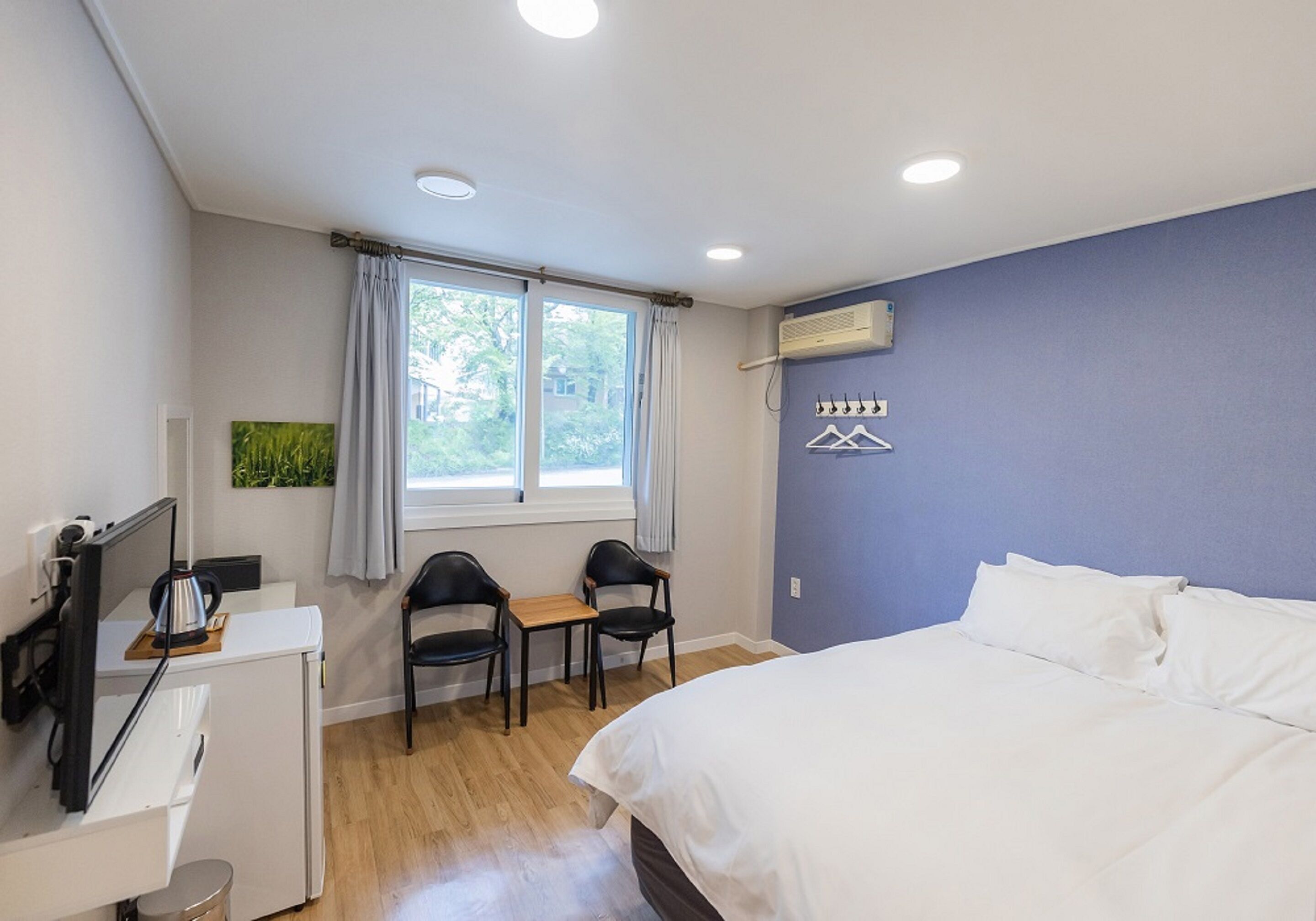 Premium bedding, down duvets, blackout curtains, free WiFi
