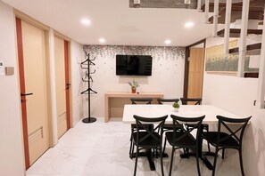 Family Loft Sixes | Living area | LCD TV - Verse Hotel Cirebon (West Cirebon)