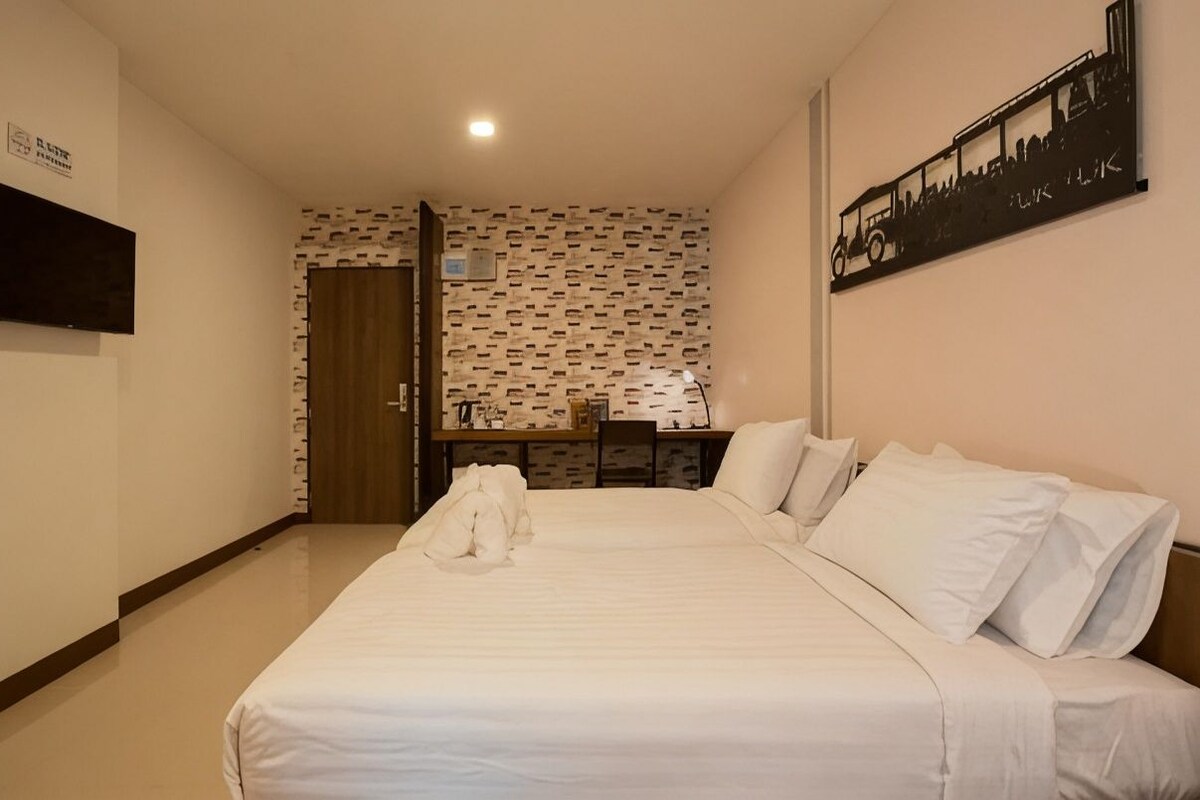Desk, blackout drapes, iron/ironing board (on request), WiFi (free)