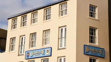 Harbourside Apartments offers comfortable living with a flat roof and multiple windows on each floor.