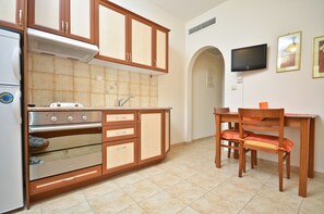 Apartment, Balcony, Partial Sea View | Private kitchen | Fridge, oven, stovetop, coffee/tea maker - Anthi Studios (Naxos)