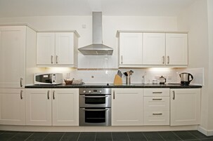 Appartamento, 2 camere da letto | Cucina privata | Frigorifero con congelatore, microonde, forno, piano cottura