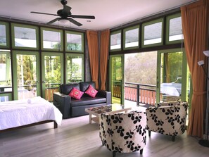 Suite superior, 1 habitación, balcón, vistas al mar | Zona de estar