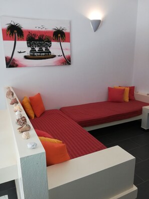 Apartamento standard, acessível | Sala de estar