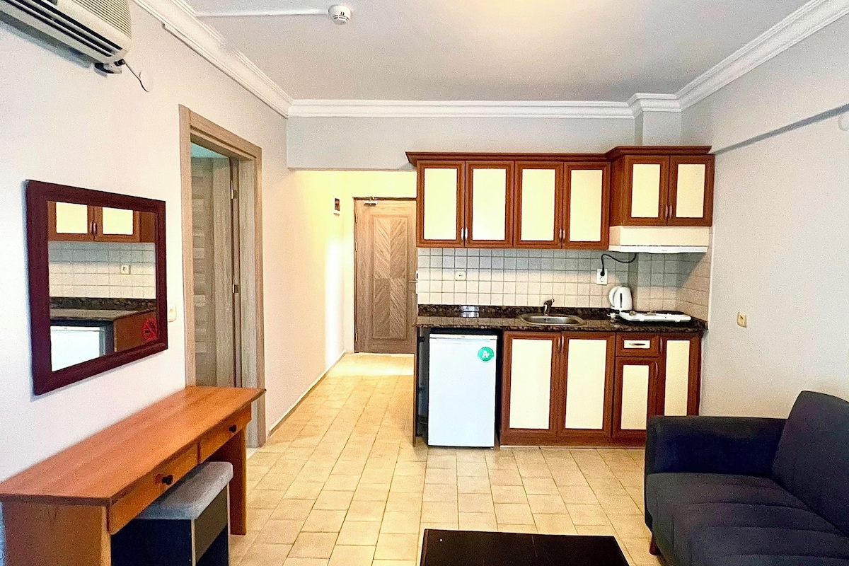 Klassiek appartement, balkon | Een kluis op de kamer, gratis wifi, beddengoed
