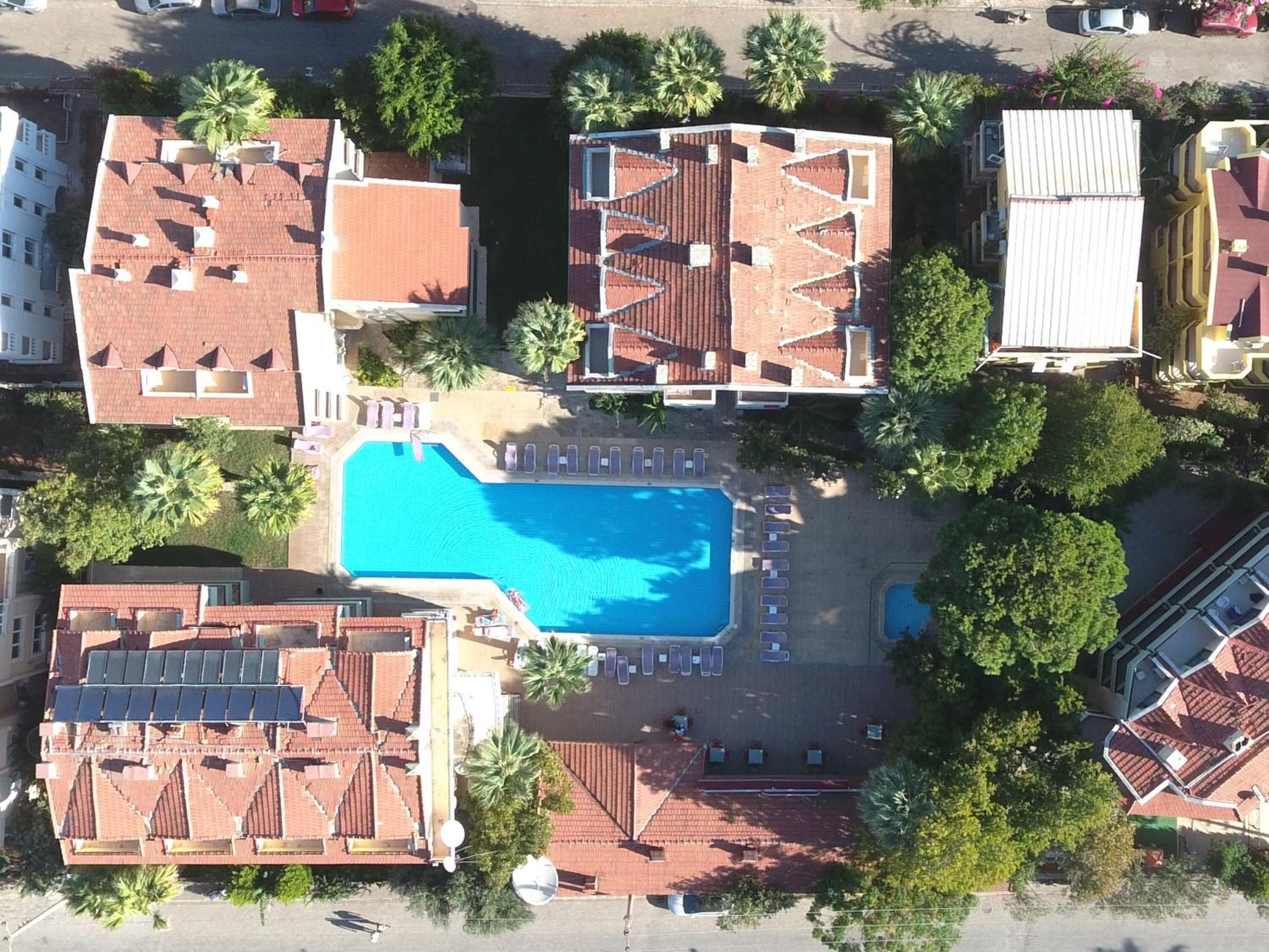 outdoor pool, pool umbrellas, pool loungers