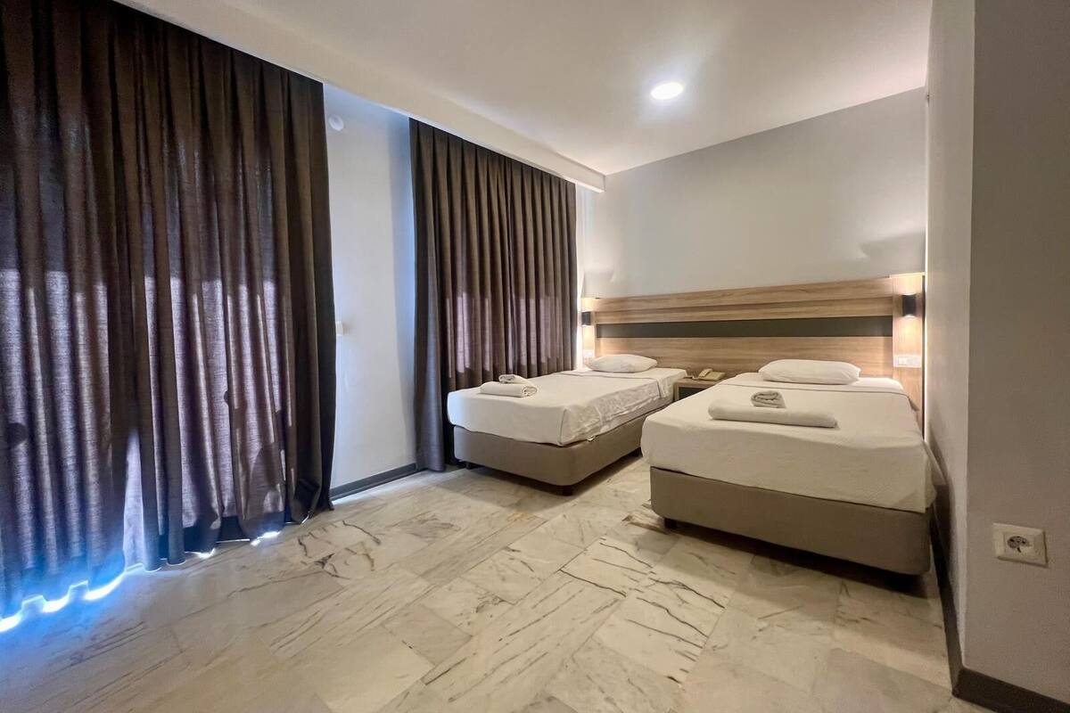 Coffres-forts dans les chambres, Wi-Fi gratuit, draps fournis