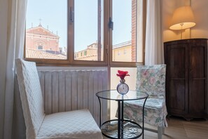 Chambre avec lits jumeaux (External Private Bathroom) | Coin séjour