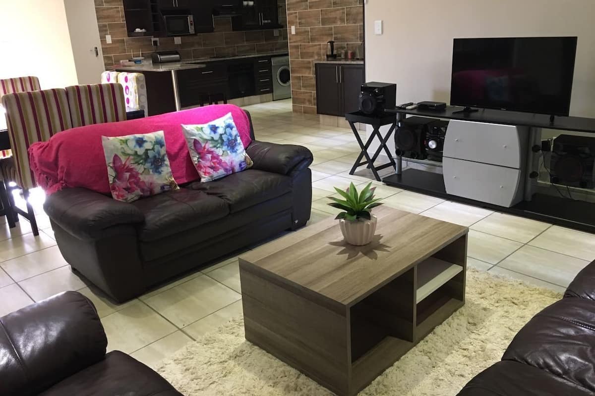 32-inch flat-screen TV with satellite channels, TV
