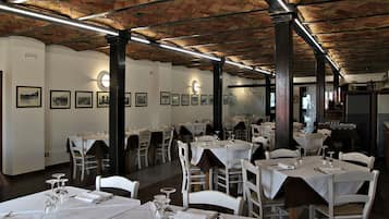 Breakfast, lunch, dinner served; local cuisine