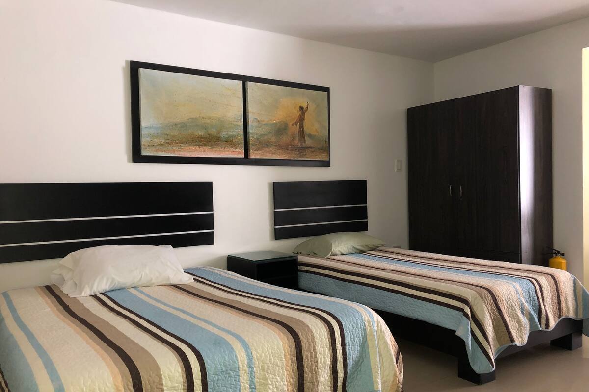Family Triple Room, 1 Bedroom | In-room safe, iron/ironing board (on request), WiFi (free), bed sheets