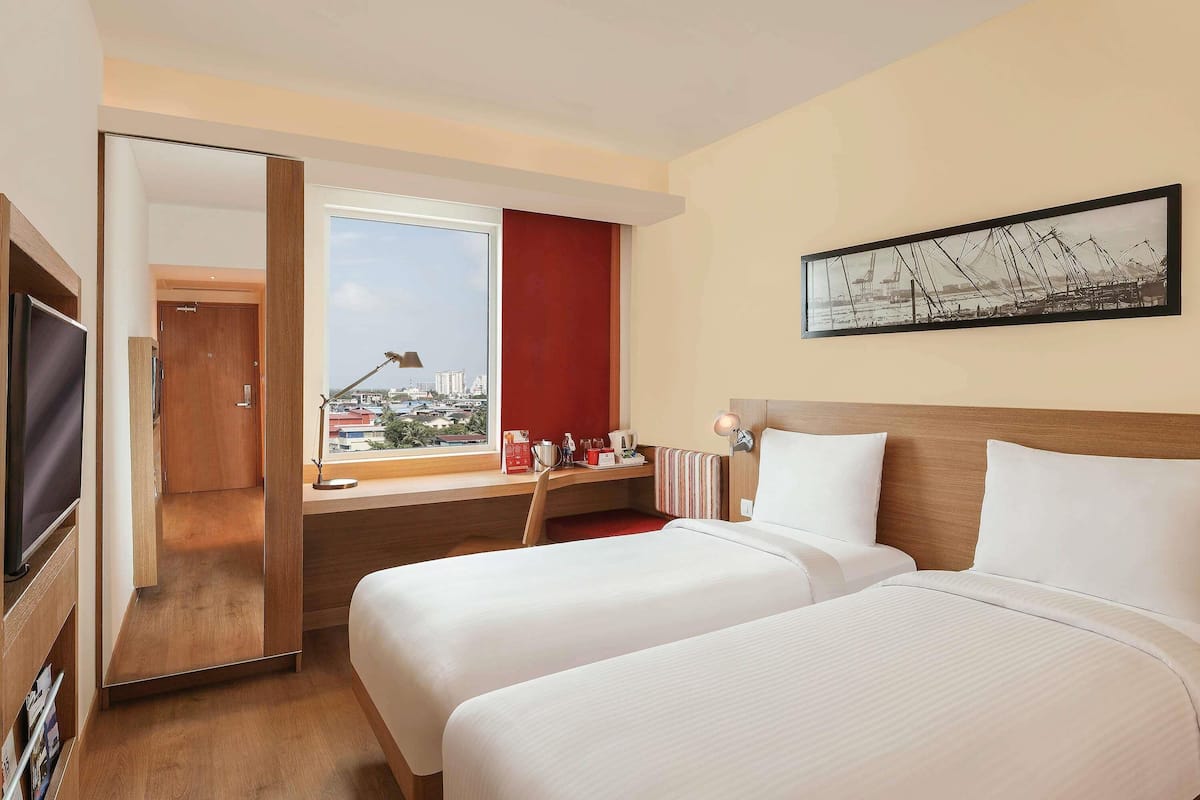 Ropa de cama de alta calidad y minibar