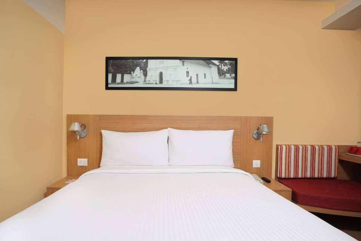 Ropa de cama de alta calidad y minibar