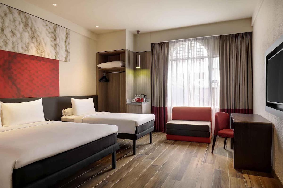 Family Room, Multiple Beds | Minibar, in-room safe, desk, laptop workspace