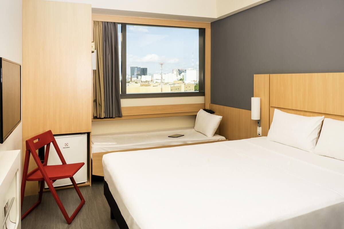 Standard Room, Multiple Beds | Minibar, in-room safe, desk, blackout drapes