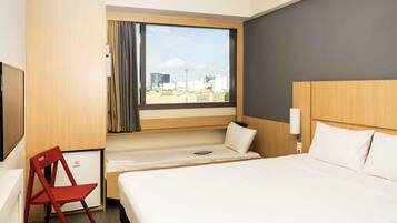 Standard Room, Multiple Beds | Minibar, in-room safe, desk, blackout curtains