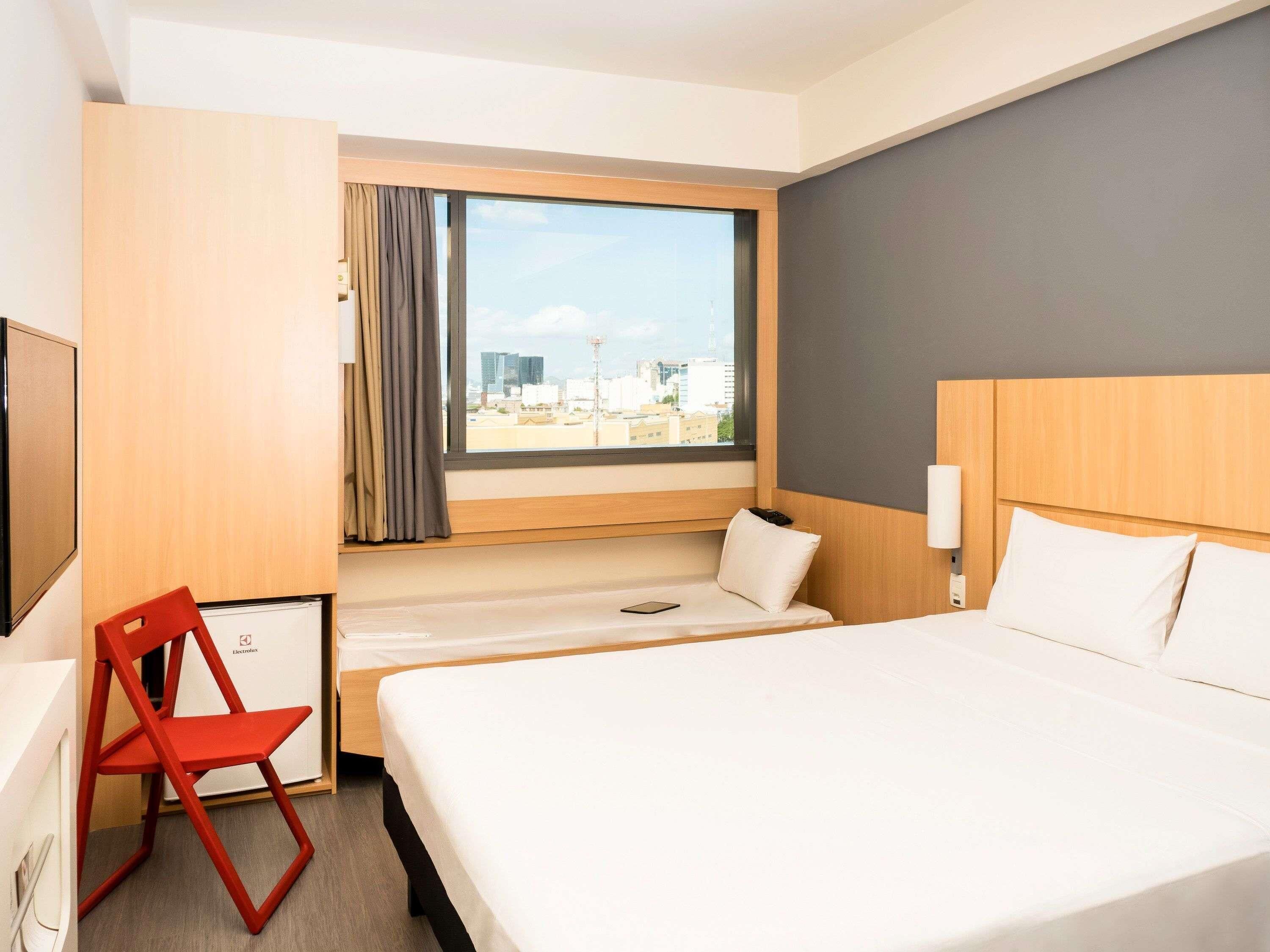 Standard Room, Multiple Beds | Minibar, in-room safe, desk, blackout drapes