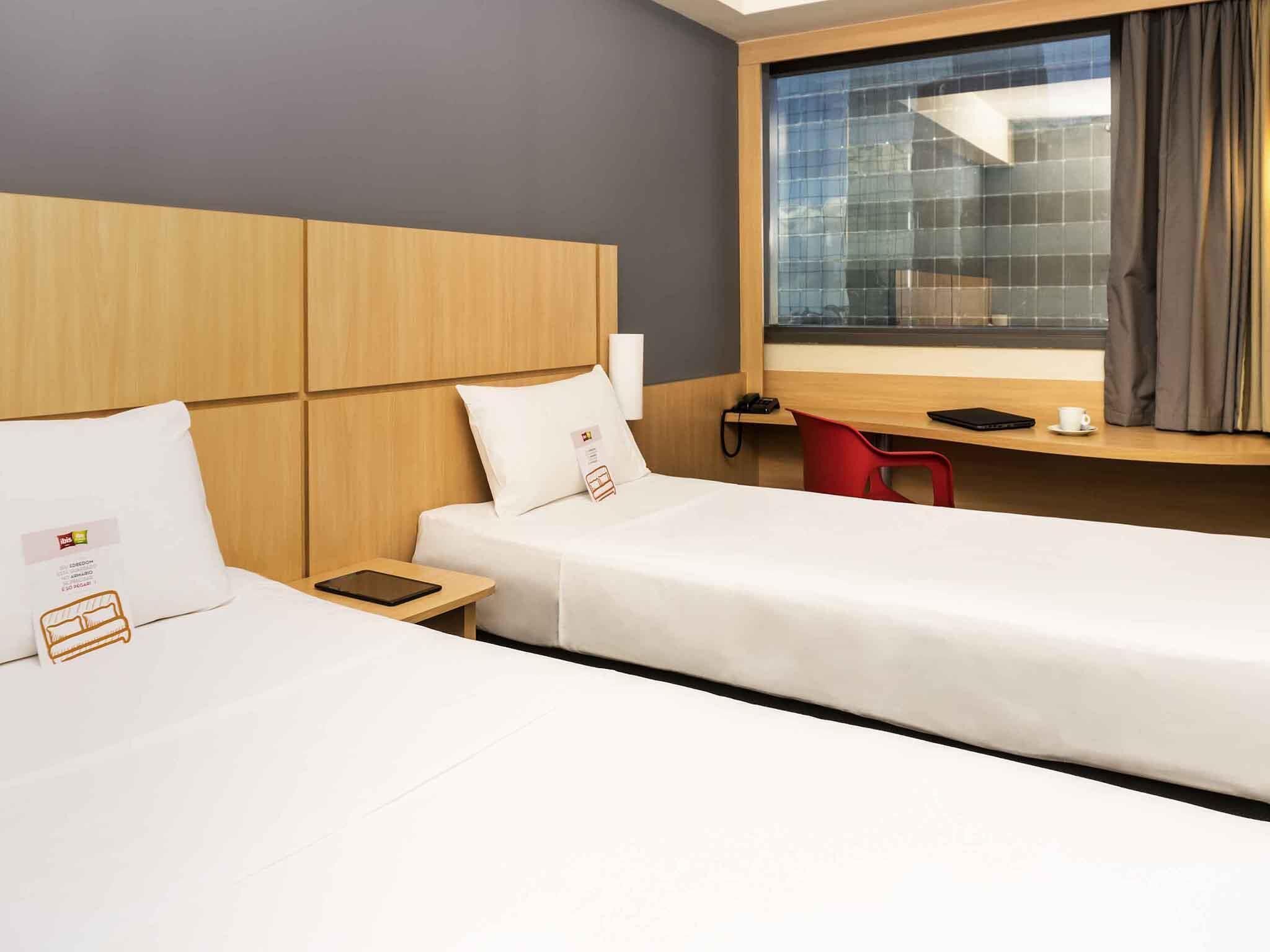 Standard Room, 2 Twin Beds | Minibar, in-room safe, desk, blackout drapes