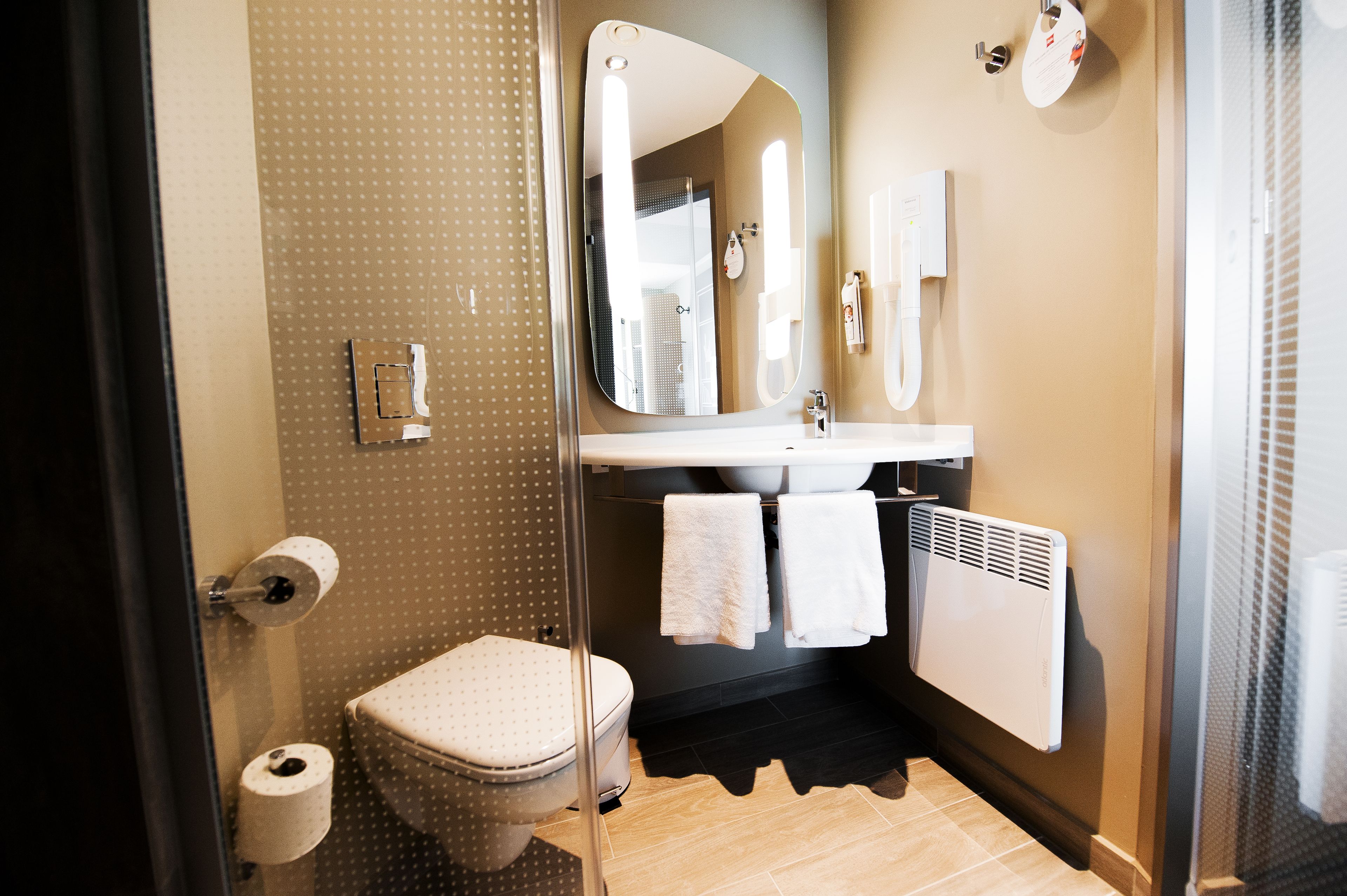 standard twin room, 2 single beds | bathroom | shower, eco-friendly toiletries, hair dryer, towels