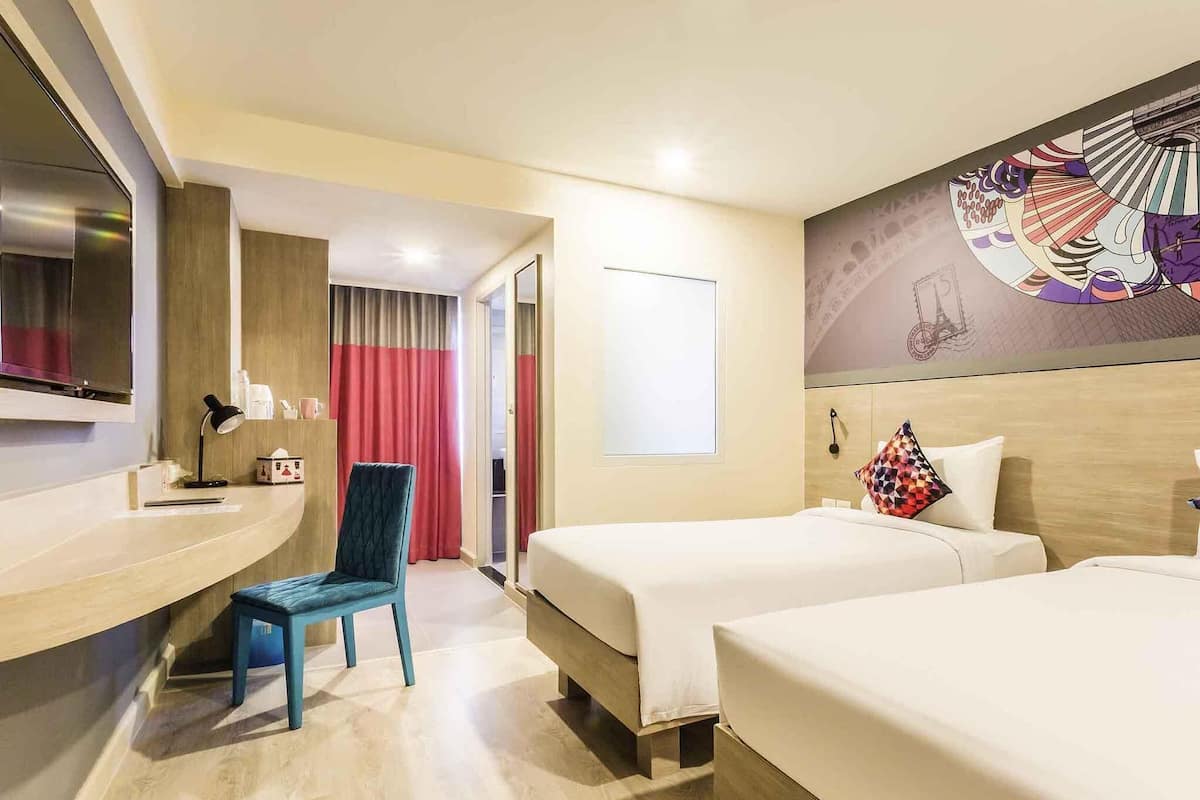 Kahden hengen standard-huone (kaksi sänkyä), 2 yhden hengen sänkyä | 1 makuuhuone, minibaari, tallelokero huoneessa