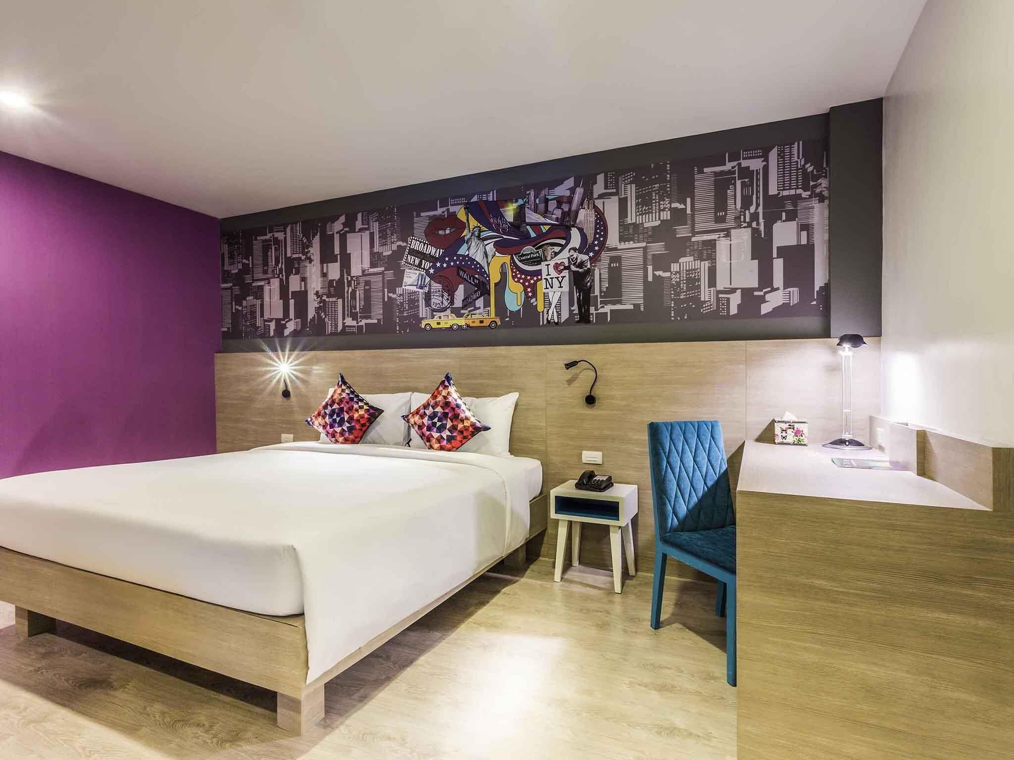 Suite, 1 King Bed with Sofa bed | Minibar, in-room safe, individually decorated, desk