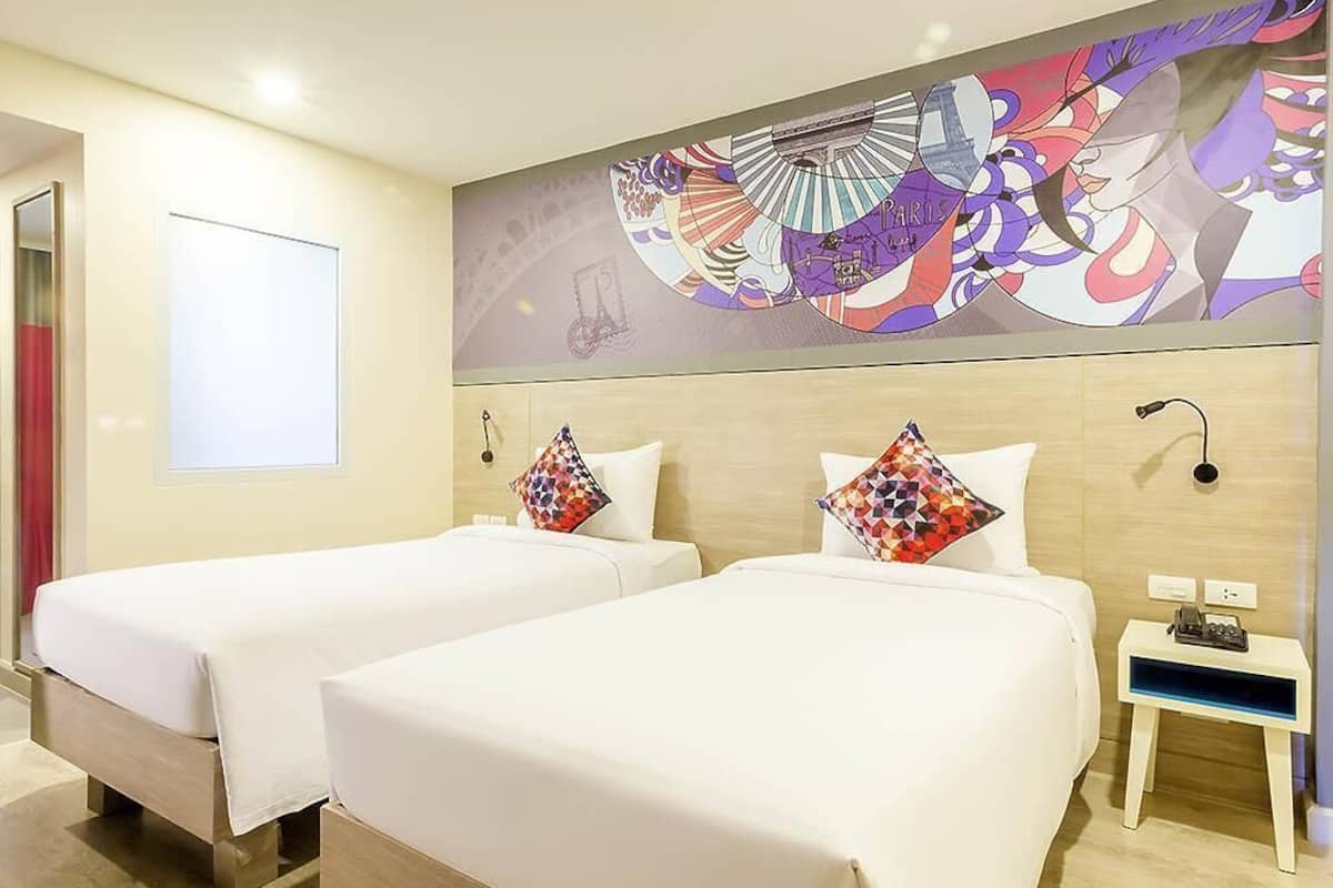 Standard Twin Room, 2 Twin Beds | Minibar, in-room safe, individually decorated, desk