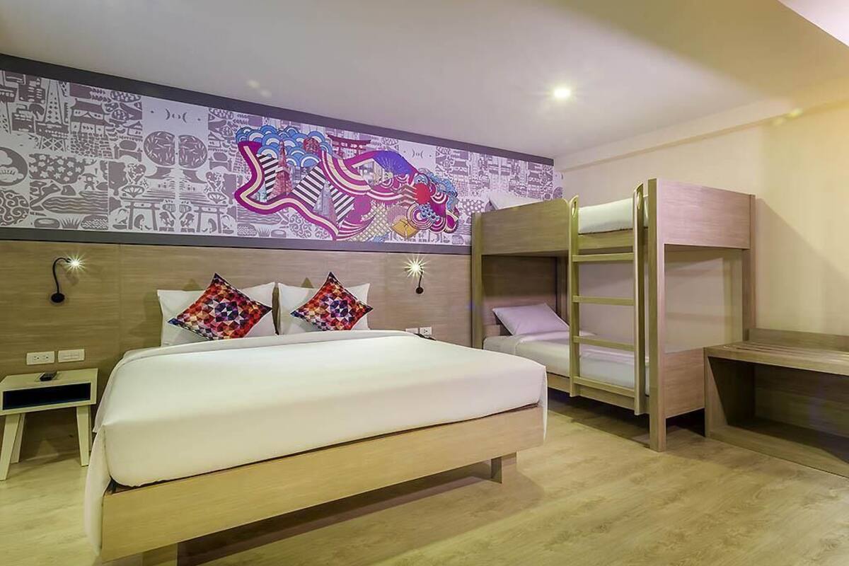 Family Room, Multiple Beds | Minibar, in-room safe, desk, free cots/infant beds