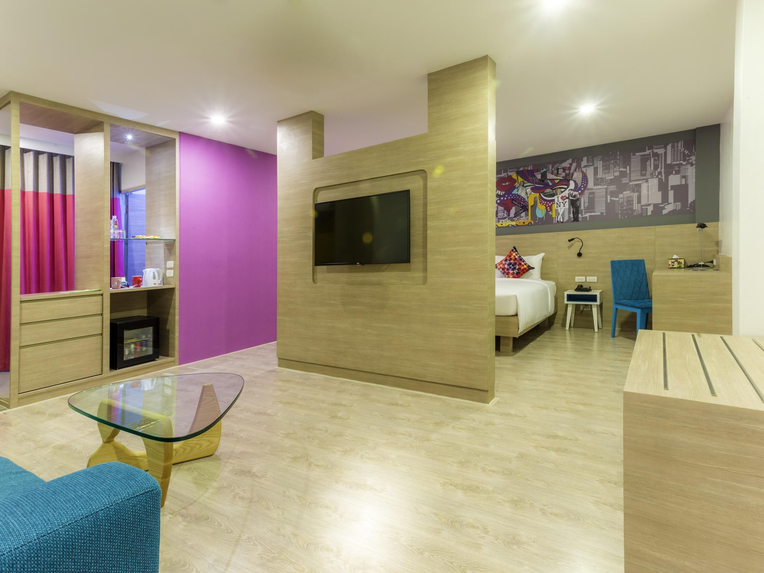 Suite, 1 King Bed with Sofa bed | Minibar, in-room safe, individually decorated, desk