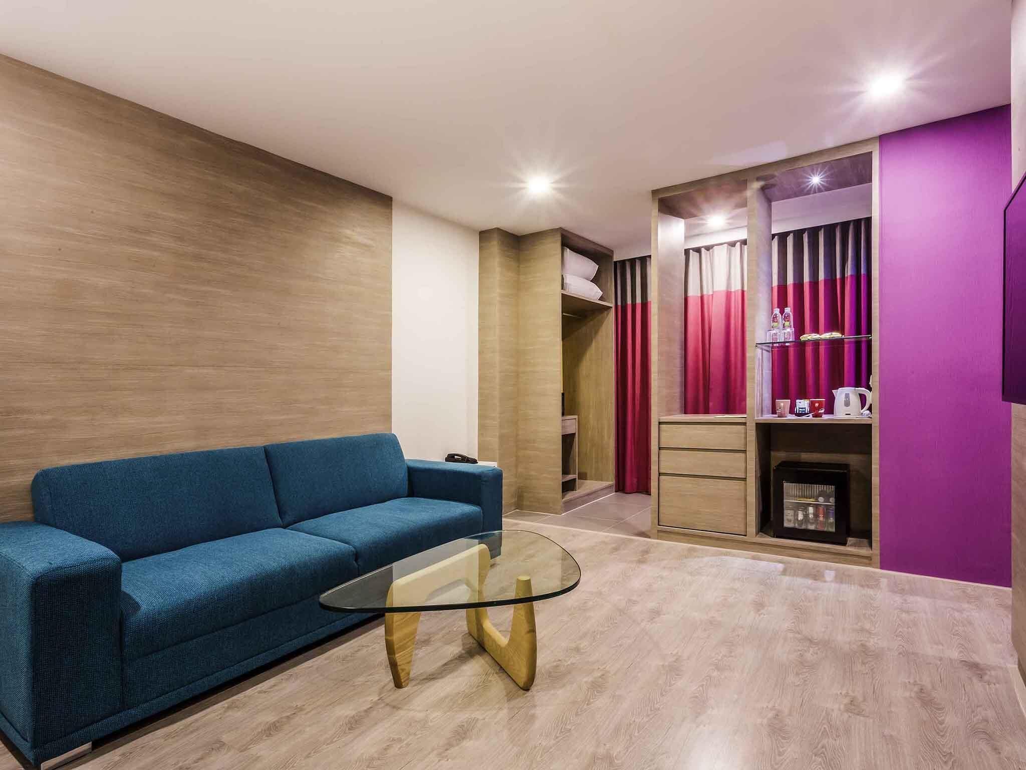 Suite, 1 cama King size y sofá cama | Minibar, caja de seguridad en la habitación y decoración personalizada 