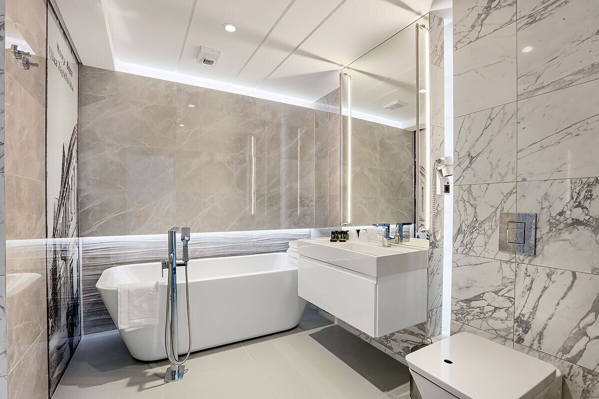 Superior Room, 1 King Bed with Sofa bed | Bathroom | Designer toiletries, hair dryer, towels, soap