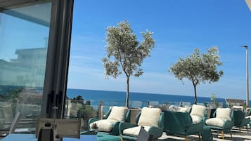 Tweepersoonskamer, uitzicht op zee | Terras