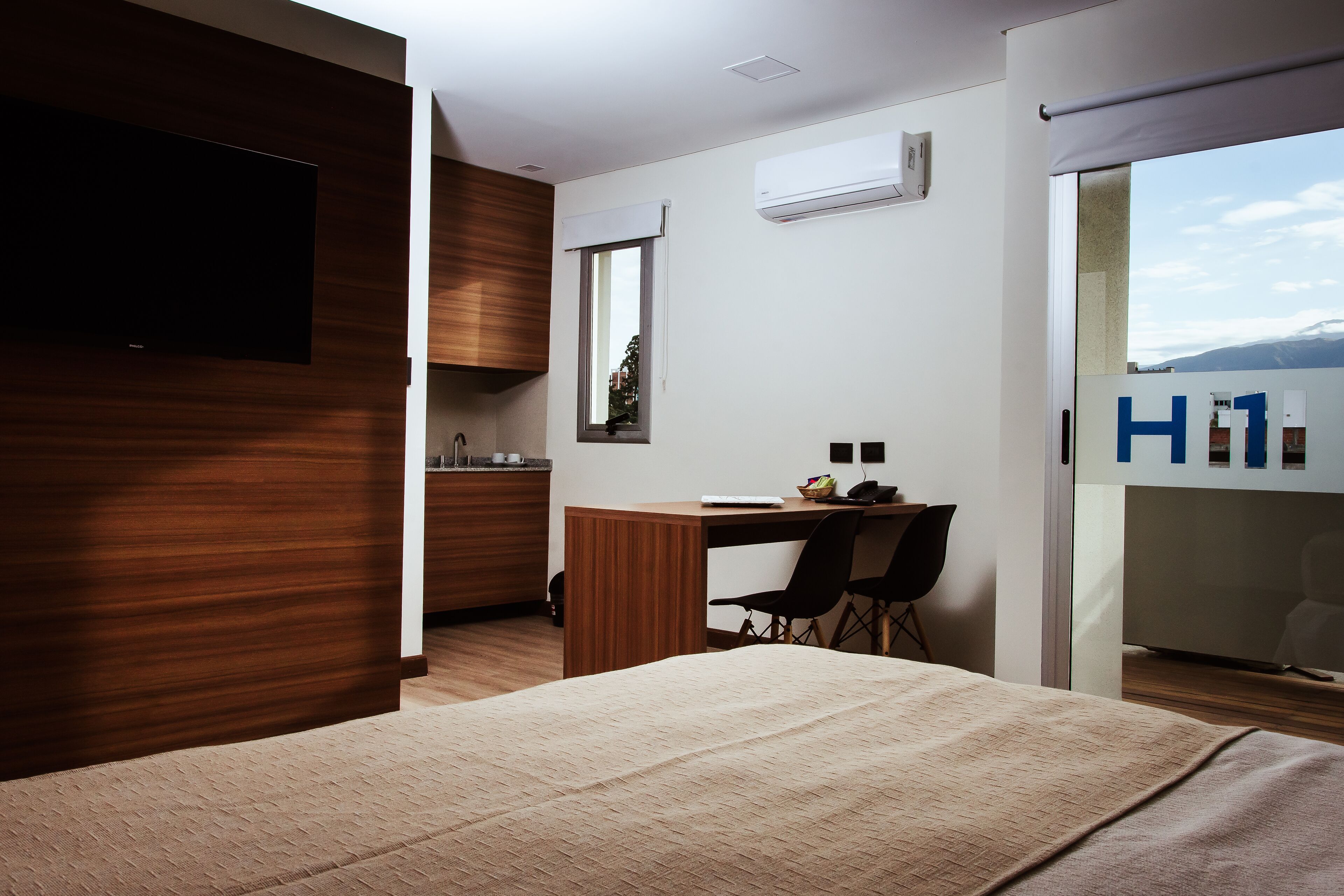 Kamar Double atau Twin Comfort | Minibar, brankas, ruang kerja ramah laptop, dan seprai linen