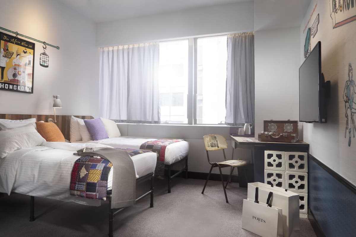 Coffres-forts dans les chambres, fer et planche à repasser