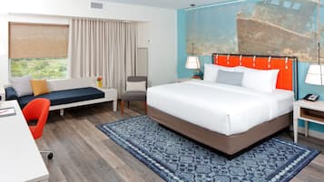 Desk, laptop workspace, iron/ironing board, free cribs/infant beds