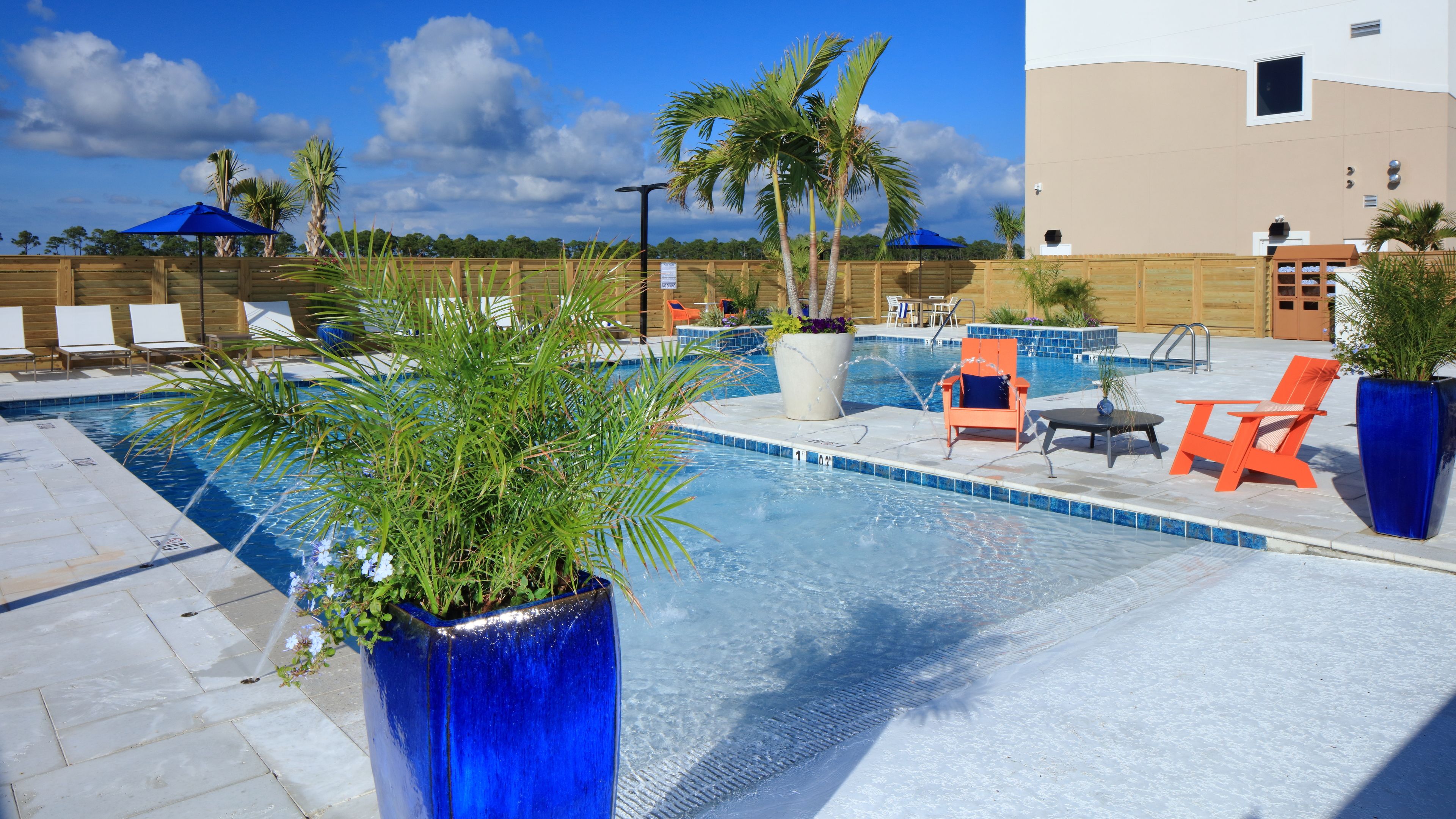 indoor pool, outdoor pool, pool umbrellas, pool loungers