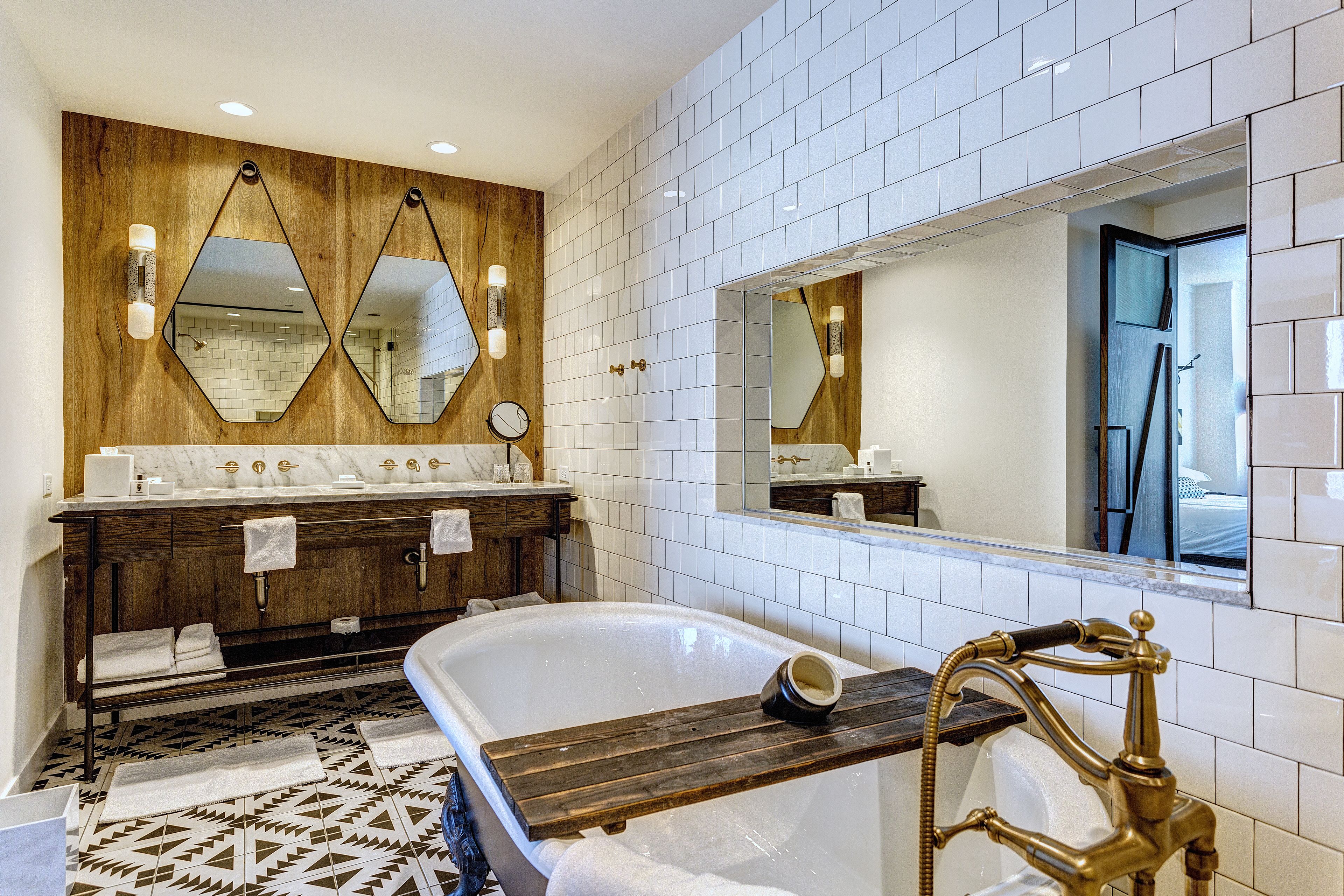 designer toiletries, hair dryer, bathrobes, slippers